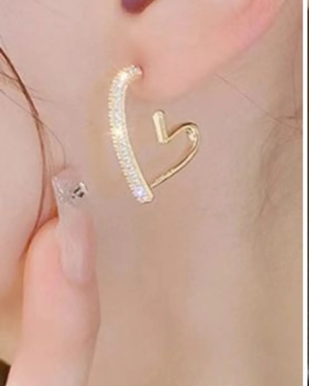 Golden heart-shaped hoop earrings