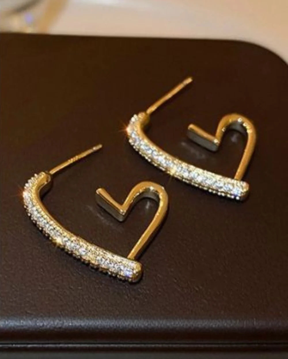 Golden heart-shaped hoop earrings